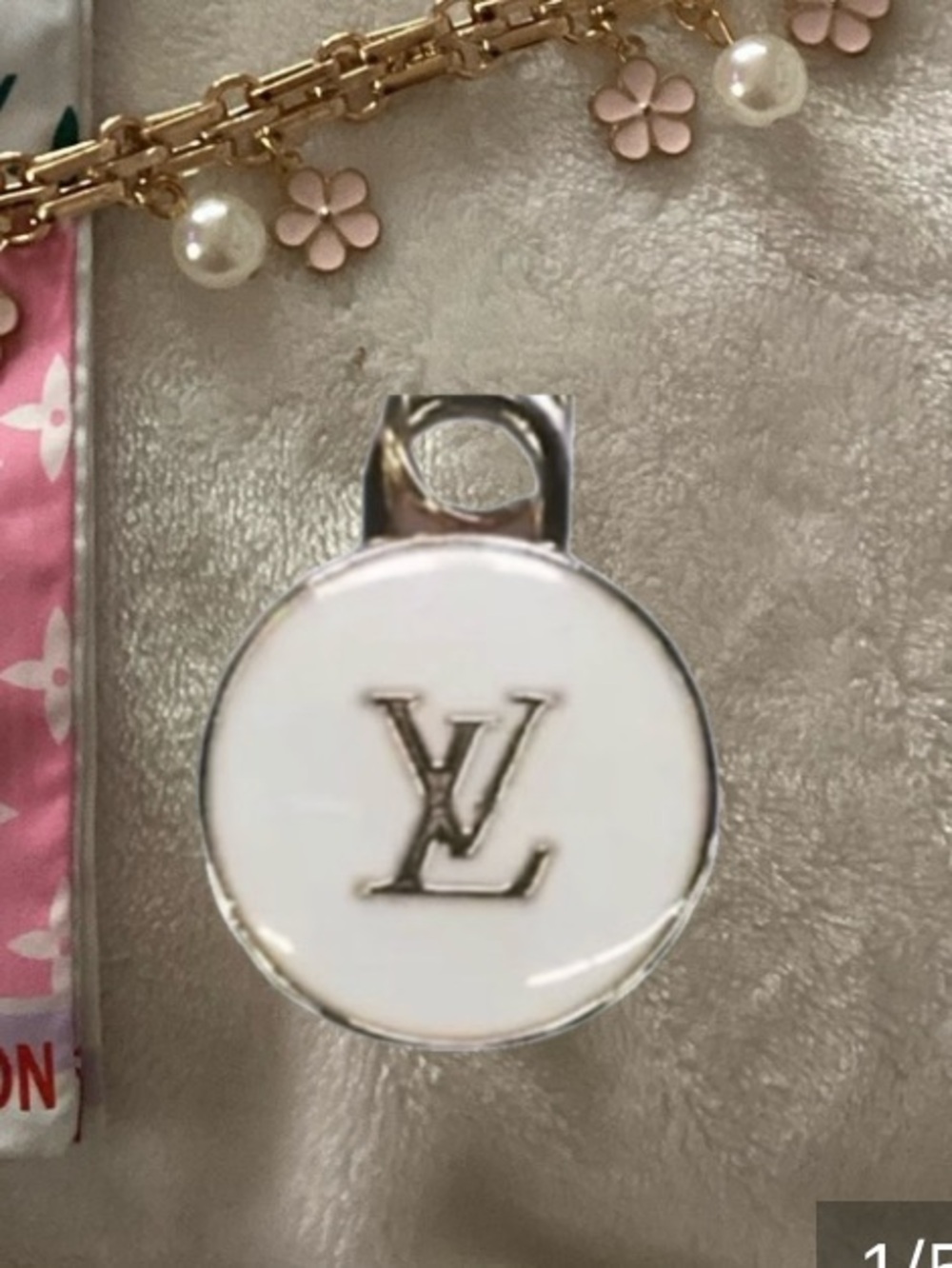 Charm and reversible Twilly with extra charm chain.